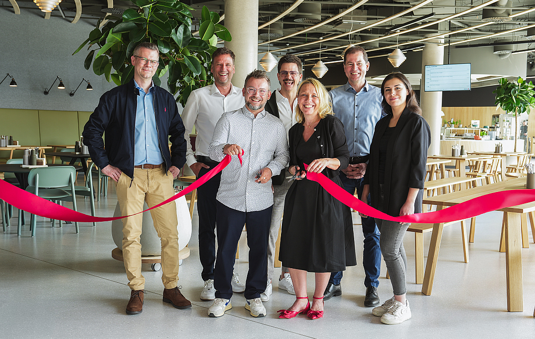 A ribbon-cutting ceremony to open the new cafe